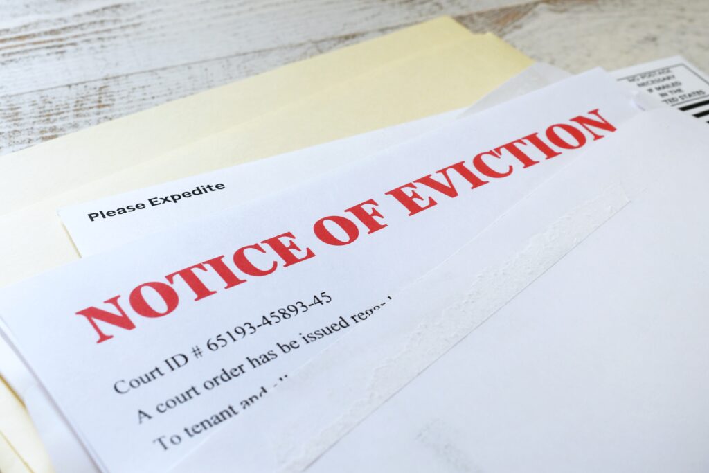Eviction notice letter indicating legal action due to missed mortgage payments, highlighting the importance of addressing financial issues promptly.