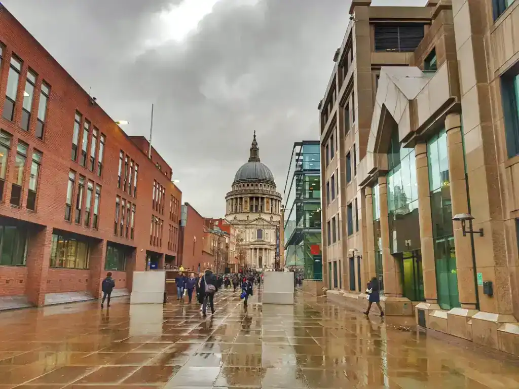 Modern cityscape with historic and contemporary buildings, reflecting the costs involved in purchasing commercial property in a vibrant urban area.